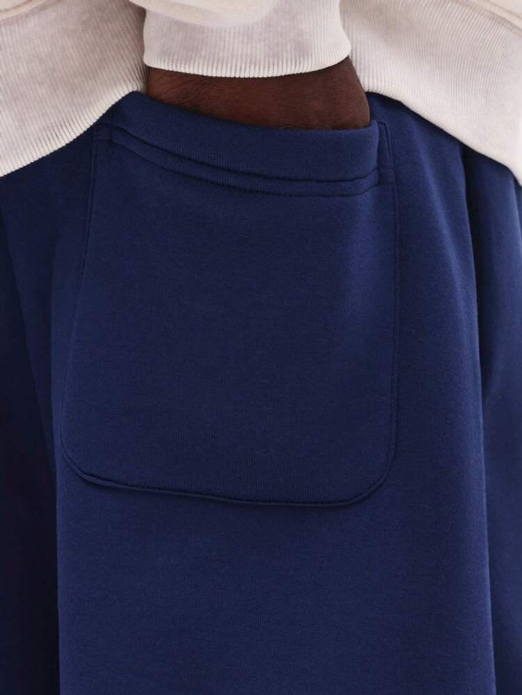 Sweatpants With Numeric Print And Logo