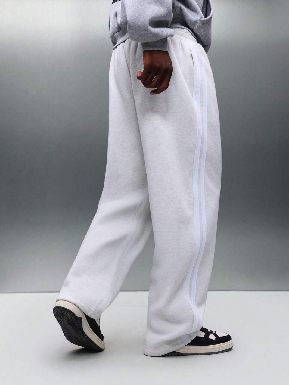 PLAYBOY X SUMWON Relaxed Fit Sweatpants With Side Stripe Detail And Small Logo Embroidery For Casual Loungewear And Weekend Comfort