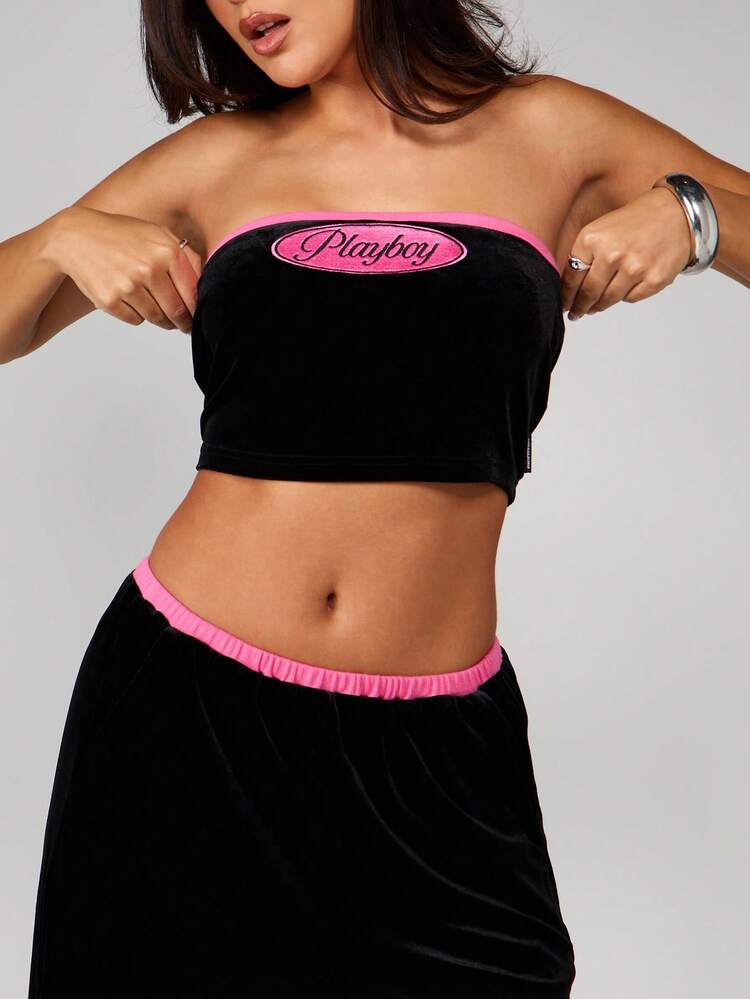 Missguided x Playboy Completo da tuta in velluto con top corto senza spalline e pantaloni a zampa larga, coordinato da relax con bordi rosa