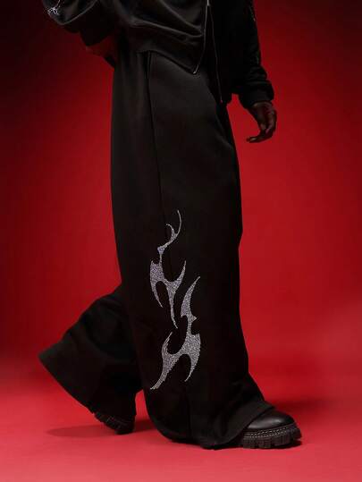  Pantalones de chándal holgados con estampado de llamas de rhinestone, de corte amplio y suelto para uso casual y urbano de la marca SUMWON