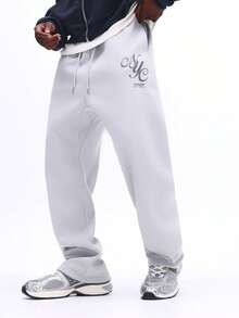 SUMWON Pantalón de chándal con logo impreso, cintura con cordón, puños elásticos y bolsillos laterales para un uso casual cómodo - Gris - Ver 1