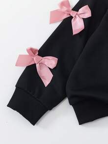 Sweetra 2件套年轻女孩简约时尚粉色蝴蝶结黑色上衣和粉色裤子运动服套装 - 查看 3