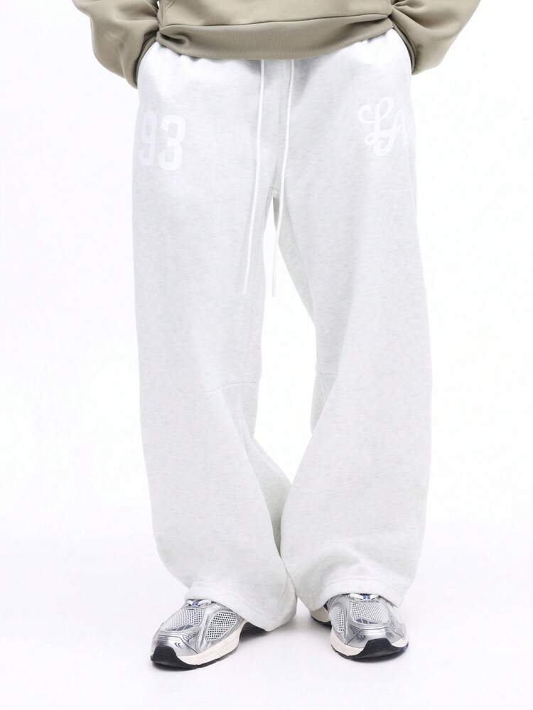 Pantaloni della tuta grigio mélange con coulisse e polsini