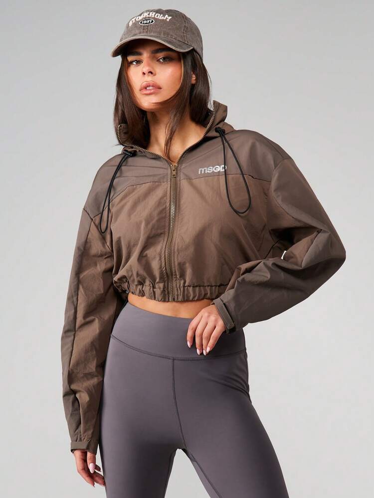 MISSGUIDED MSGD Hooded Cropped Windbreaker Jacket With Zip Closure And Adjustable Drawstring Hood For Layering And Casual Streetwear Style