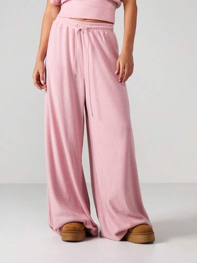 MISSGUIDED Pantalones de chándal de pierna ancha con cordón en color rosa polvo, con cintura elástica y ajuste holgado para comodidad y estilo