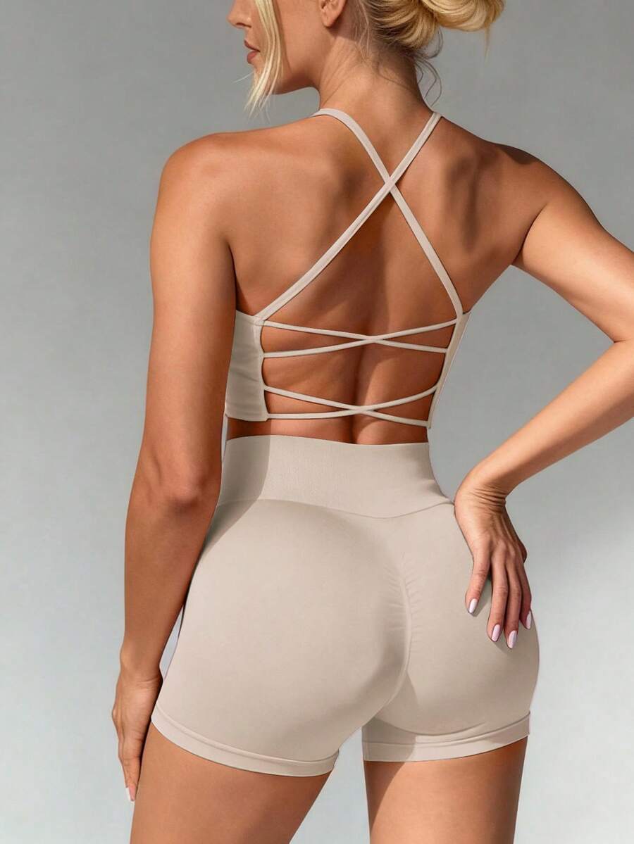 Easithlete Lady Beige Two-Piece Tank Top And Shorts Seamless Knitted Sleeveless Beautiful Back Cross-Back Tank Top With Suspender, High-Waisted Lifting Buttocks Yoga Shorts, Sports Compression Soft Elastic Tight-Fitting Breathable Long-Style Sports Shorts, Tight Pants With Sexy Silhouette, Suitable For Running, Cycling, Fitness, Outdoor Sports, Training. Thickened, Fashionable IN Style Sports Suit, Suitable For Spring, Summer And All Seasons. Best-Selling Product, Popular Style. - Apricot - View 1