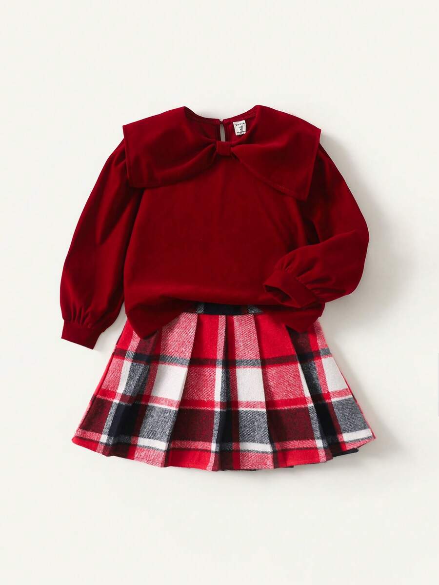 Maija Kids Maija Kids Bộ 2 áo len nhung mềm mại cổ tròn thắt nơ và chân váy ngắn kẻ caro cho bé gái, thích hợp mặc vào dịp Giáng sinh, tiệc tùng ngày lễ và phong cách đi học - Nhiều màu - Xem 1