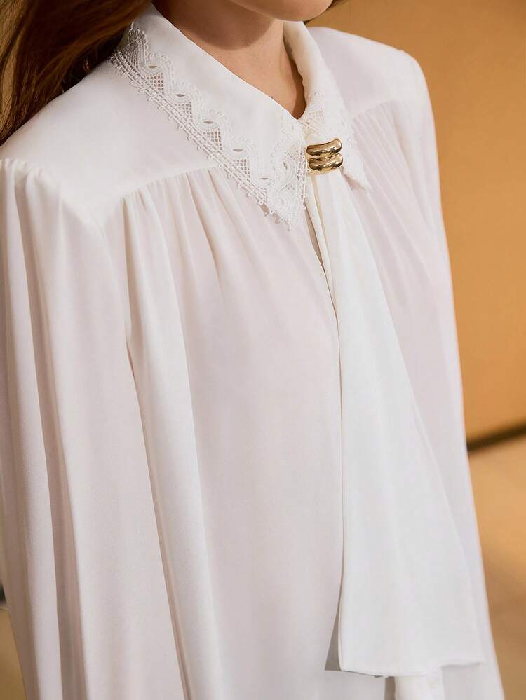 Blusa oversize con spalle ampie e pieghe, vestibilità morbida