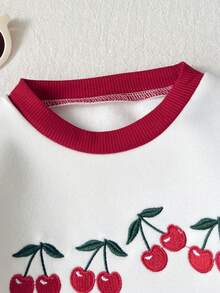SHEIN 2 piezas Conjunto de niña bebé dulce y lindo con parte superior de sudadera de manga larga con cuello redondo y estampado de cerezas rojas y blancas, y pantalones de chándal con cintura elástica, de textura suave y gruesa, cómodo, para Navidad, Año Nuevo, fiestas, uso diario, primavera, otoño e invierno - Blanco - Ver 3
