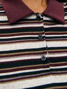 Nöista 长袖条纹 Polo 领上衣，采用柔软的中等厚度针织面料，营造出轻松休闲的学院风。百搭实用，无论是舒适的周末、轻松的春假，还是精致的假日造型，都是完美之选。 - 彩色 - 查看 6