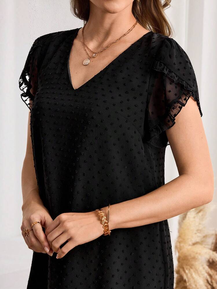 This Romantic And Elegant Women's Dress Features A Classic Pure Black Color Adorned With Delicate Polka Dots, Perfectly Matching The Refined Atmosphere Of The New Year While Exuding A Gentle And Fashionable Feel. The Understated Polka Dot Pattern Adds A Touch Of Retro Romance To Its Simplicity. The V-Neck And Sheer Sleeves, Combined With A Loose, Mid-Length Design, Create A Light And Airy Look That Is Flattering For Various Body Types. Suitable For Spring And Autumn (With A Jacket) Or Early Summer, This Dress Can Be Brightened Up With Bright Accessories For The New Year. It's Perfect For Casual Gatherings Or Everyday Outings, Showcasing A Retro Taste With The Polka Dot Pattern While Adding A Touch Of Femininity With The Sheer Details. It's A Versatile Piece That Combines Romance And Style In Your New Year's Wardrobe.