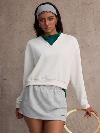 CourtClass Sudadera deportiva minimalista de 2 en 1 con contraste de color para mujer en otoño