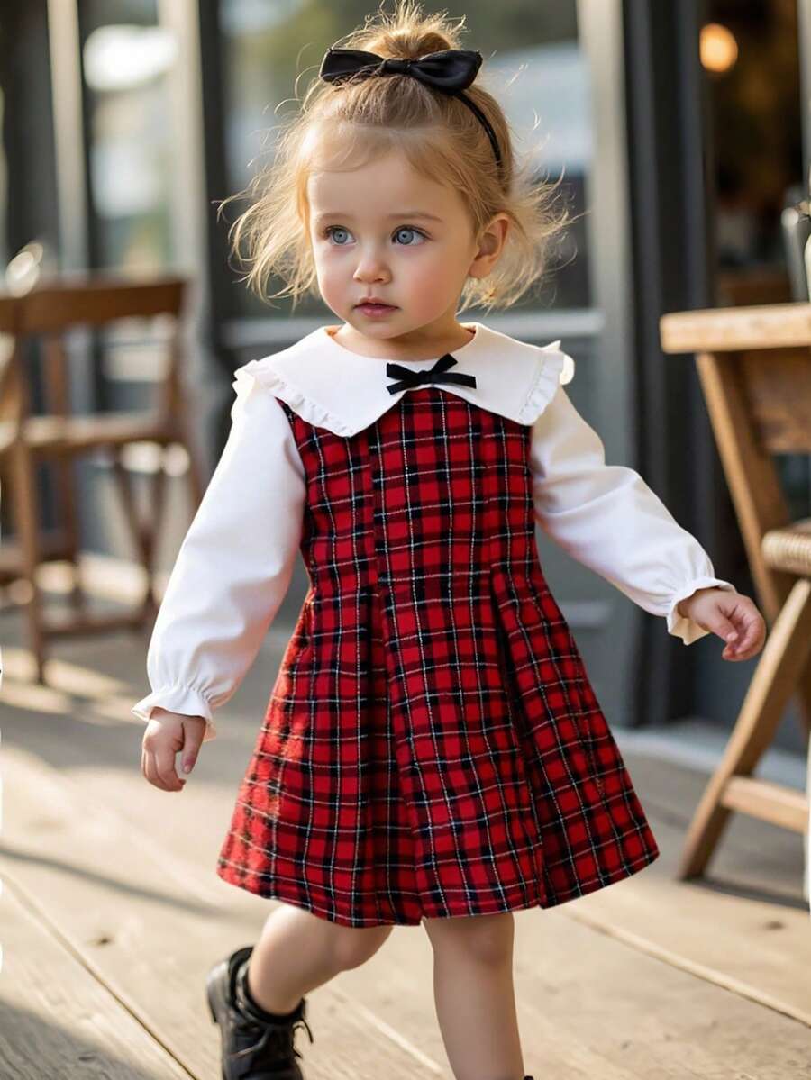 Souflis Souflis 女婴白色布料荷叶边蝴蝶结领泡泡袖连衣裙,搭配红色格子背带裙,优雅可爱,适合日常、通勤、休闲穿着。 - 彩色 - 查看 1