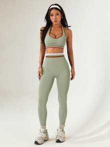 Dewbera Bộ đồ thể thao áo hở lưng và quần legging viền tương phản dành cho nữ - màu xanh lá - Xem 4