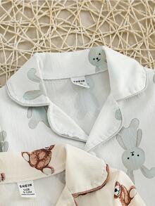 SHEIN Vintaside Kids Bộ 4 món đồ ngủ hở lưng cho bé trai, áo dài tay và quần dài, họa tiết thỏ và gấu dễ thương, vải mềm mại, thoải mái và phù hợp để bé trai mặc hàng ngày - trắng - Xem 4