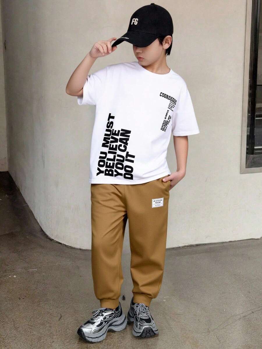 SHEIN 2pcs Kids/Tween Boys Casual Everyday Comfortable Letter Print Pattern Crew Neck Loose Pullover Short Sleeve T-Shirt And Solid Color Relaxed Fit Pants Set Boy Casual Sets Boys Casual Pants Suit Outfit For 12 Years Old - Multicolor - View 1