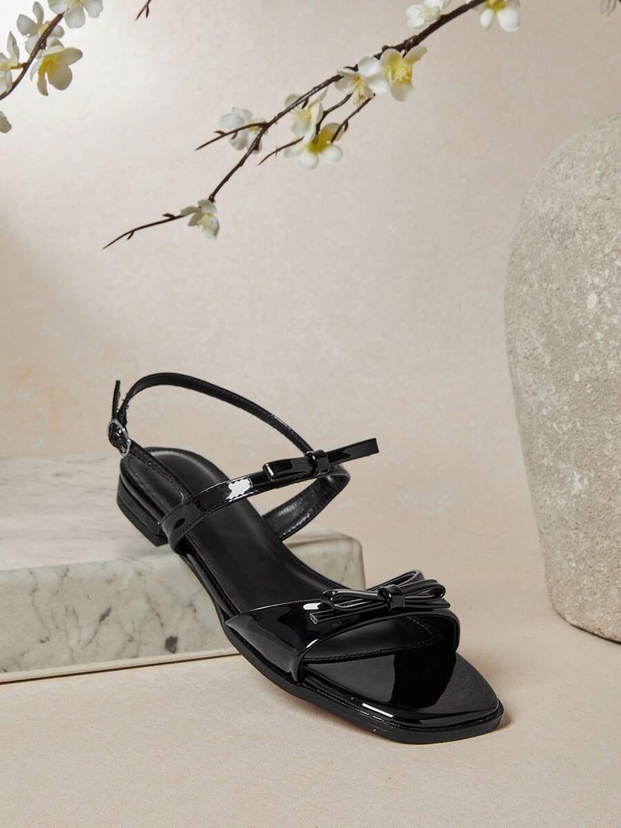 SHUZIA Women's Elegant Ribboned Strap Sling-Back Flat Sandals - Black - View 1