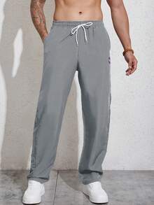 Manfinity Homme Men's Sporty Casual Wear, Featuring An INS-Style Package Of Straight-Leg Casual Pants With A Simple Woven Label Design That Offers Great Value. These Pants Have A Drawstring Design, Making Them Suitable For Music Festivals And Everyday Wear, For Fall - Grey - View 3