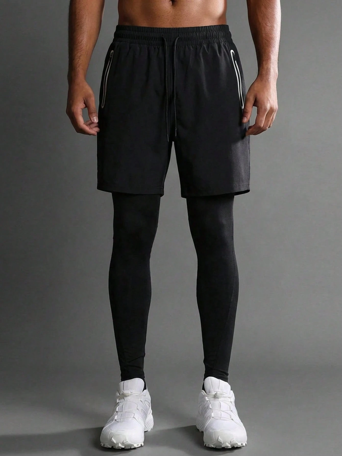 Collant a compressione con pantaloncini sportivi