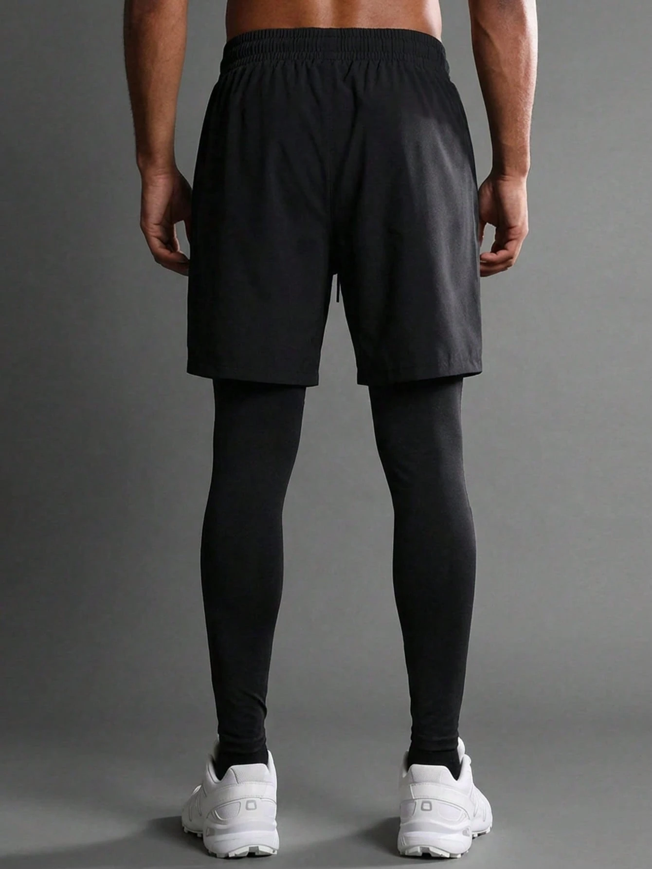 Collant a compressione con pantaloncini sportivi