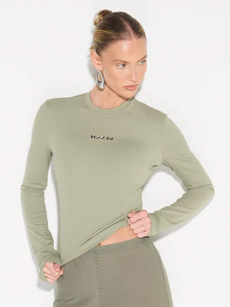 KIZN Long Sleeve Crew Neck Top With Logo Print And Fitted Silhouette For Women Casual Layering Basics