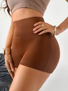 SuitURBody Pantalones cortos de ciclismo con tiras cruzadas en marrón, diseño sexy en la espalda, alta elasticidad, cómodos y minimalistas, que realzan el trasero, tipo pantaleta para mujer - Café integral - Ver 2