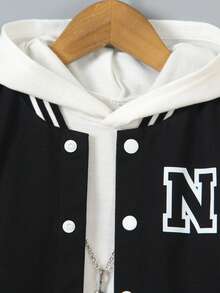 SHEIN Young Boys 2pcs Set: Black Knit Sweater With White Sleeves, Featuring Large Letter "N" Print On Front; Paired With Matching Printed Sports Pants, Ribbed Collar, Cuffs & Hem For Comfort; Casual, Sporty Style Suitable For Spring/Fall, Daily Wear, School, Travel