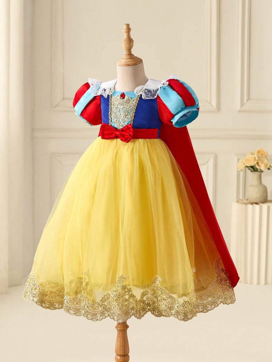 SHEIN Glamorique Kids Vestito da principessa per ragazze, vestito da principessa giallo, maniche a sbuffo, gonna ampia in tulle giallo, abito da festa di compleanno, matrimonio, occasioni formali, abito da cerimonia, fiocco, pizzo, nastro, elegante abito formale, pizzo dorato idrosolubile, mantella rossa, stile mediorientale ed europeo - Giallo - Visualizzare 1