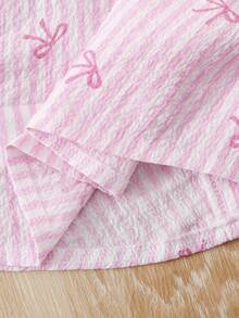 少女夏季休闲条纹蝴蝶结印花露背衬衫