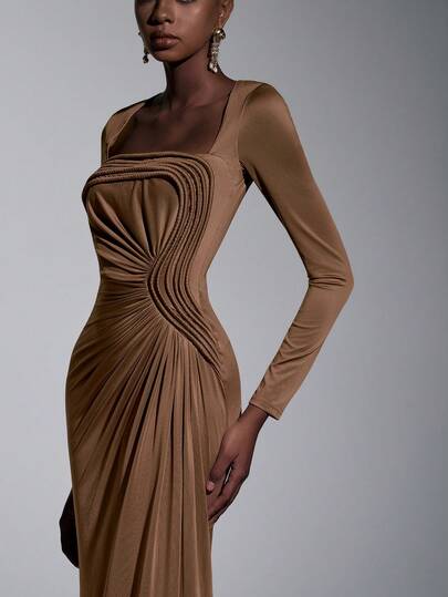 Elitara Elegant, Stylish, And Captivating, This Brown Stretch Knit Dress Features A Textured Fabric, A Trapezoidal Neckline, Long Sleeves, Pleats, A Fishtail Hem, And A Train. Suitable For All Formal Occasions, This Sophisticated Evening Gown Is Perfect For A Sophisticated Evening Event.