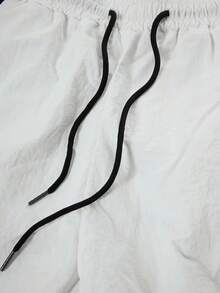 Sport MetroGents Quần thể thao cạp rút họa tiết chữ và tạ cho nam - trắng - Xem 3