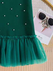 SHEIN Playful Pals Newly Launched! Young Girl Sleeveless Dress In A Stylish And Elegant Debutante Style. Features A Round Neck With Delicate Tulle Splicing, Hand - Sewn Beads, And A Tulle - Trimmed Hem. It Combines Comfort, Fashion, Exuding A Sweet And Cute Charm.