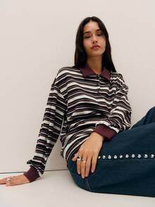 Nöista 长袖条纹 Polo 领上衣，采用柔软的中等厚度针织面料，营造出轻松休闲的学院风。百搭实用，无论是舒适的周末、轻松的春假，还是精致的假日造型，都是完美之选。 - 彩色 - 查看 3