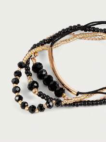 Glisma 4 件套时尚黑水晶手工串珠手链套装，适合女士，时尚度假派对珠宝礼物 - 黑色 - 查看 4