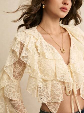 Poéselle Women's Lace Ruffle Tie-Front Crop Blouse – Ivory Long-Sleeve Romantic Boho Top For Cottagecore & Date-Night Looks Lace Ruffle Blouse Tie Front Crop Top Ivory Lace Top Romantic Boho Style Cottagecore Outfit Vintage Lace Blouse Long Sleeve Crop Top Women Date Night Tops Women's Lace Layered Ruffle Front Tie Long Sleeve Fashionable Blouse Summer Tops New Year Clothes Beach Outfit