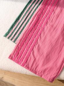 Sparklyn 两件套青少年阔腿裤：绿色条纹款和粉色休闲宽松长裤，适合青少年穿着。采用舒适的弹性腰带设计，轻便透气，是日常休闲和运动活动的理想之选。