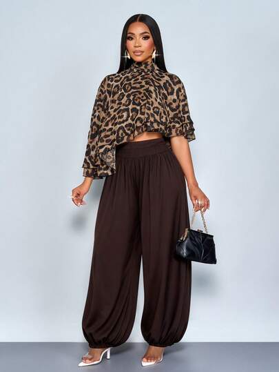SOLERSUN Women's Autumn/Winter/Spring Fashion And Elegance With Irregular Hem And Animal Print.
