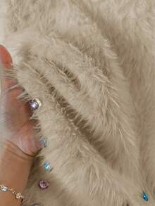 GlowEve pull col rond ajusté avec strass, fait main, en fausse fourrure de vison douce et confortable, avec ourlet asymétrique à franges. Décontracté pour tous les jours, automne/hiver - Nude - Voir 7