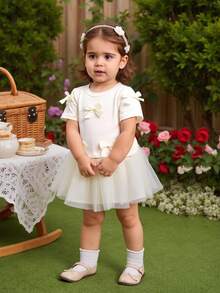SHEIN 2pcs Baby Girls Apricot Knit Short Sleeve Top Decorated With Multiple White Bows, Paired With Matching Mesh Skirt, Sweet & Cute Overall Style, Simple & Fashionable, Versatile For Comfortable Summer Outings