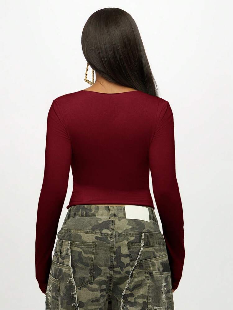 Long Sleeve Crop Top With Bow Design