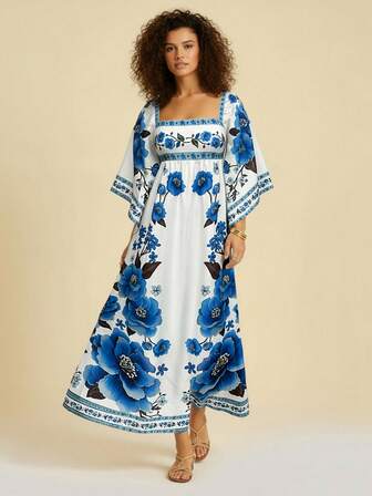 CAJUNI Vestido con mangas de ángel con estampado de flores con joyas.