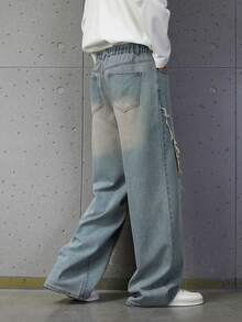 复古宽松浅蓝色牛仔裤，适合青少年男生，休闲街头风，秋冬季穿着，舒适棉质面料，毛边裤脚设计，宽松版型，松紧腰带，适合上学、日常穿着、聚会、旅行、校园等场合。 - 中等水洗藍 - 查看 5
