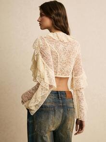 Poéselle Áo kiểu croptop ren xếp ly thắt nơ phía trước dành cho nữ – Màu trắng ngà, tay dài, phong cách boho lãng mạn cho phong cách cottagecore và hẹn hò. Áo kiểu ren xếp ly thắt nơ phía trước, áo ren màu trắng ngà, phong cách boho lãng mạn, cottagecore, áo ren cổ điển, áo croptop tay dài dành cho nữ, áo hẹn hò, áo kiểu ren xếp ly nhiều lớp tay dài thắt nơ phía trước, áo mùa hè, áo cho năm mới, kỳ nghỉ biển, ngày Valentine. - Màu be - Xem 3