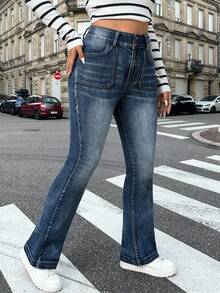 Dripcurv 大码女式蓝色修身弹力喇叭牛仔裤，休闲日常穿着，新年装扮。