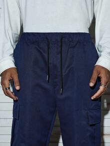 Modcrash 1 pièce Pantalon cargo slim à poches multiples de couleur unie pour hommes, convient pour la plage, les vacances, les tenues décontractées, l'entraînement, la course, les activités de plein air, les loisirs, la remise en forme, le jogging, pantalon droit, streetwear à la mode, de l'automne au printemps à l'été, style rétro américain, unisexe, tenue d'été décontractée - convient pour le port quotidien et les tenues de vacances d'été. - bleu indigo - Voir 6