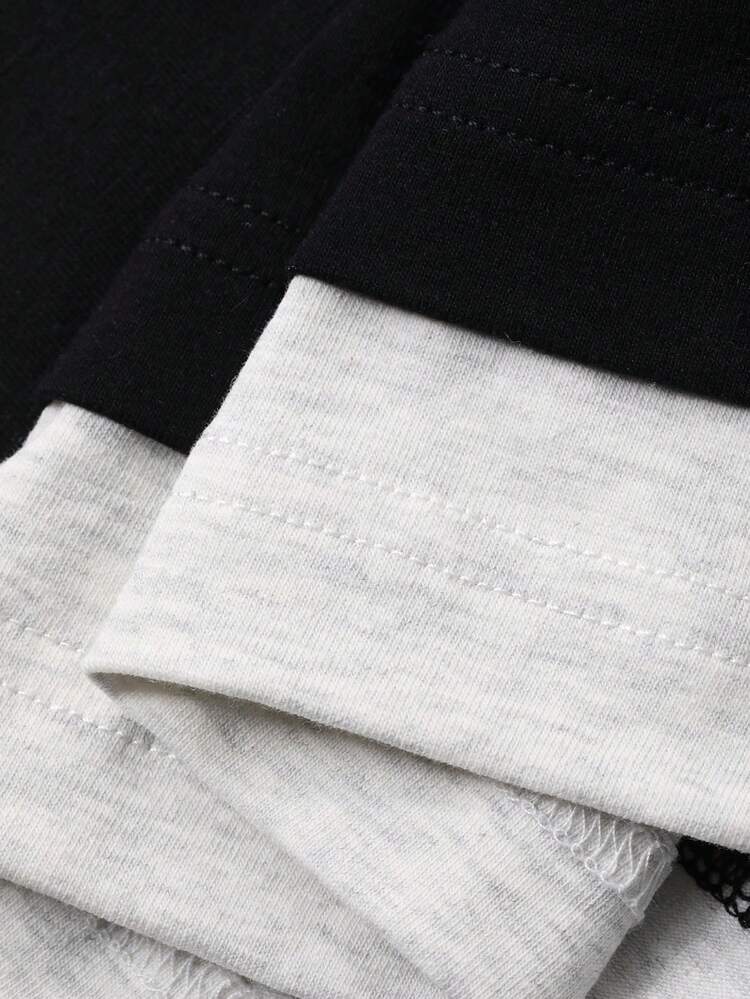 Men's Round Neck T-Shirt With 2 In 1 Collar And Hem Splicing In Black And White, Suitable For Spring And Autumn