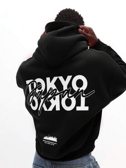 SUMWON Sudadera con capucha con estampado de graffiti y diseño de texto de Tokio en la espalda, ropa urbana casual