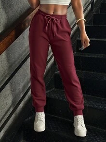 Pantalones deportivos para mujeres - pantalones de cinturón elástico ajustados por cuerda de extracción, con bolsillos, tejidos sólidos, 100% poliéster suave, ligero, cómodo y transpirable, adecuado para deportes de fitness dentro y fuera del hogar - Burdeos - Ver 3