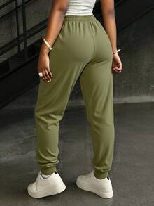 Pantalones deportivos para mujeres - pantalones de cinturón elástico ajustados por cuerda de extracción, con bolsillos, tejidos sólidos, 100% poliéster suave, ligero, cómodo y transpirable, adecuado para deportes de fitness dentro y fuera del hogar - Verde militar - Ver 3