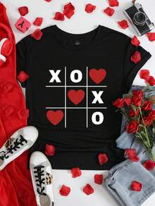 EMERY ROSE Women's Tops XOXO Heart-Shaped Printed Graphic Short Sleeve Casual Crew Neck T-Shirt, Valentine's Day - Black - View 1